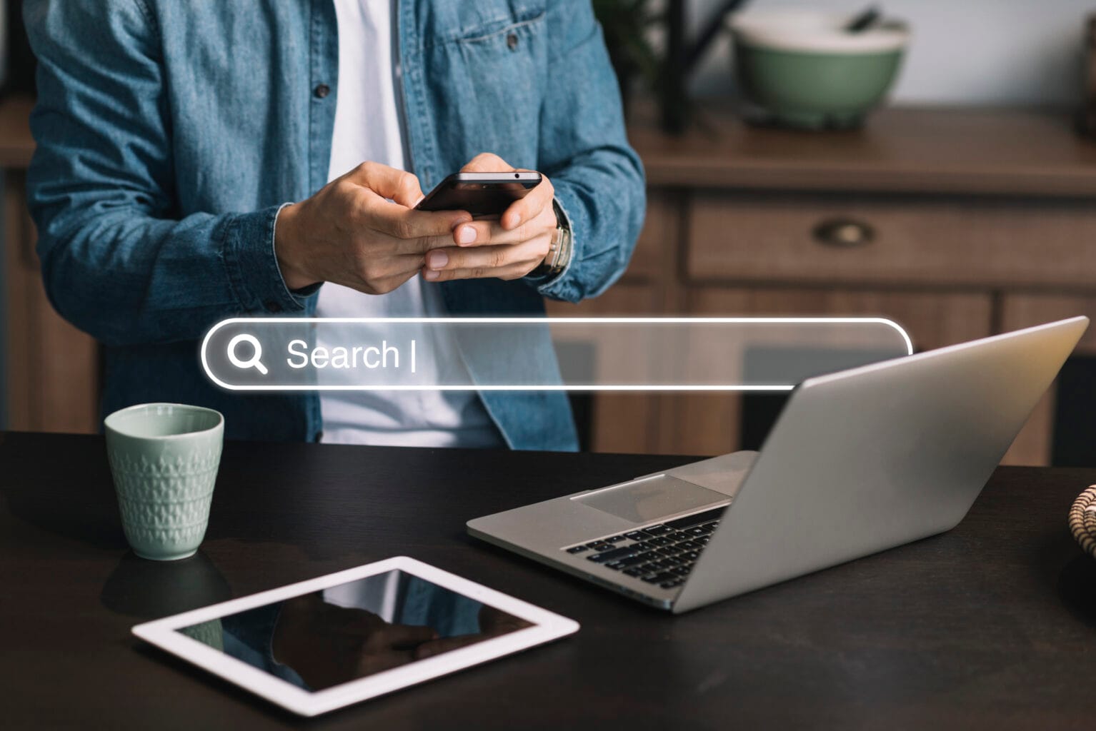 A professional using multiple devices to boost search rankings through off-page SEO and link-building tactics.